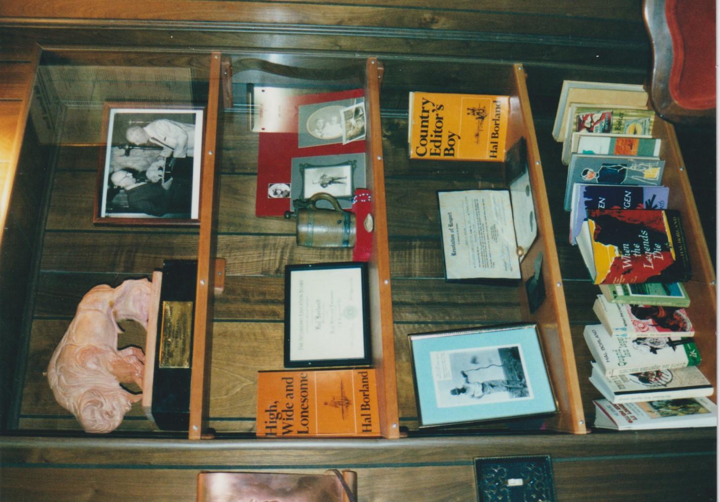 Display of books authored by Hal Borland, photos and certificates 